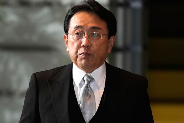 FILE - Ryosei Akazawa, newly appointed Minister in charge of Economic Revitalization, arrives at the prime minister's office Tuesday, Oct. 1, 2024, in Tokyo. (AP Photo/Hiro Komae)