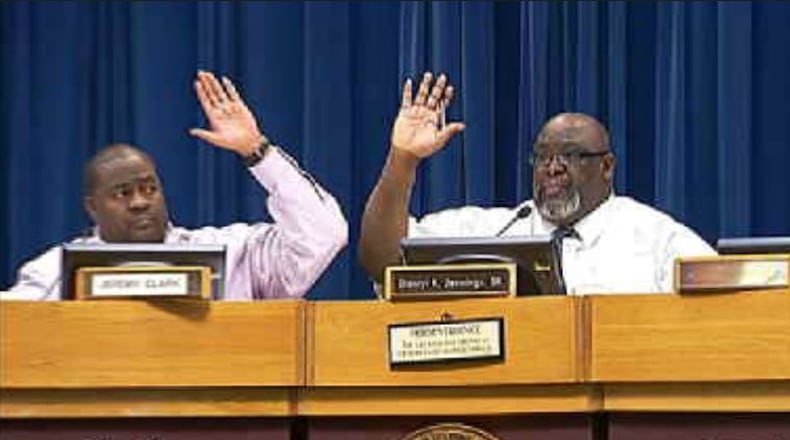 Jerry Clark and Darryl Jennings Sr., members of the DeKalb Zoning Board of Appeals, voted in November 2012 to approve a permit for a Lulu Billiards to operate as a nightclub. CREDIT: WSB-TV