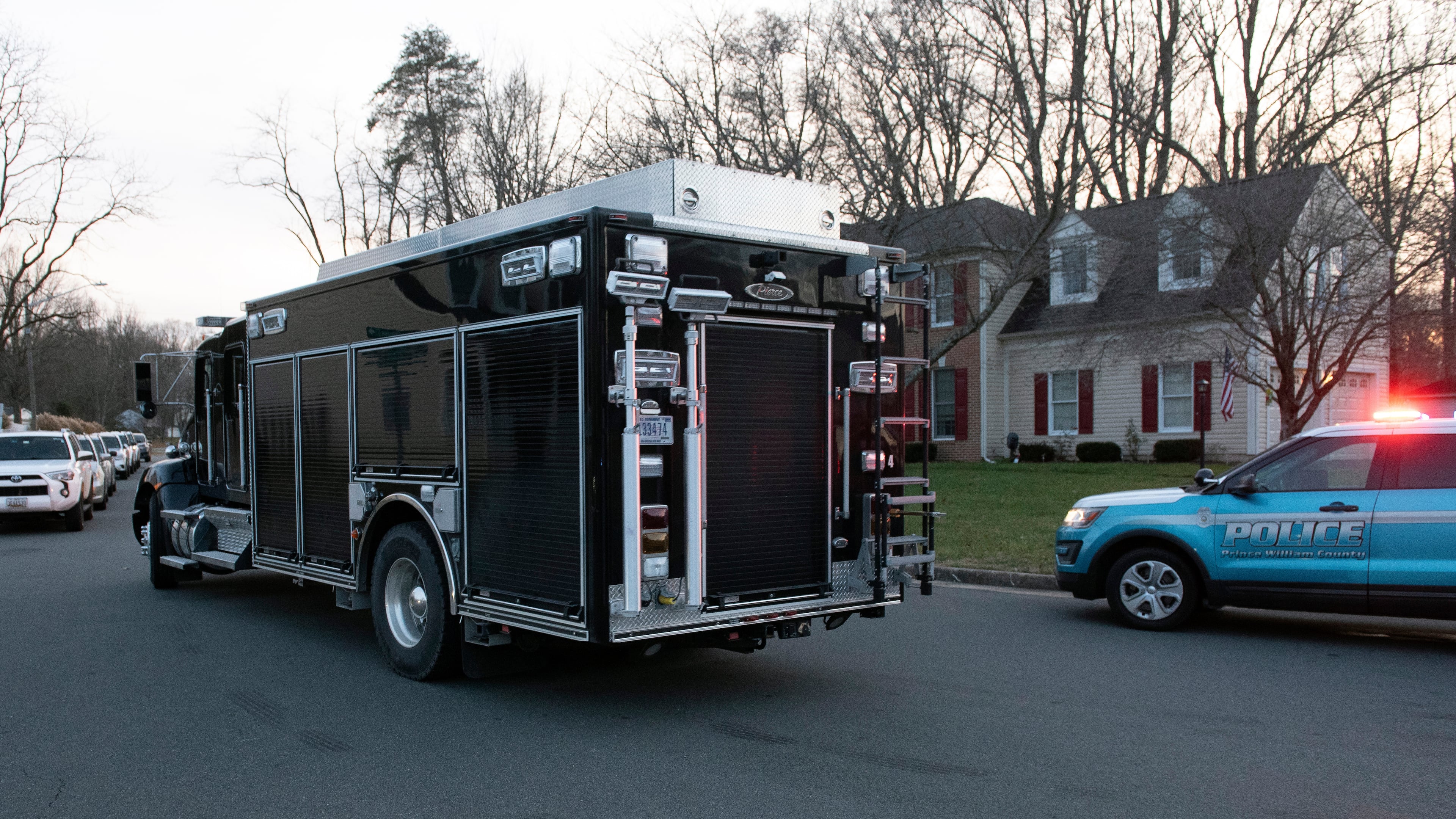 An FBI truck departs the street where the FBI made an arrest and are investigating a house in Woodbridge, Va., Thursday, Dec. 4, 2025. (AP Photo/Cliff Owen)