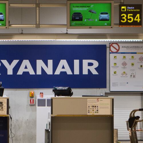 FILE - The Ryanair desk is seen, Aug. 10, 2018, at the Barajas airport in Madrid, Spain. (AP Photo/Paul White, File)