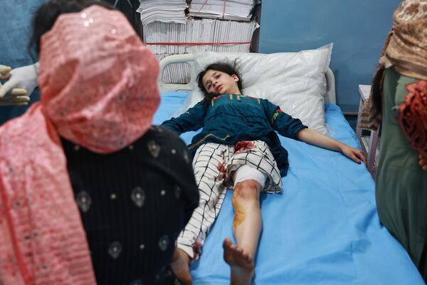 A girl who lives in a village near the Line of control between India and Pakistan, and got injured during shelling by Pakistan gets treated at a hospital in Uri, Indian controlled Kashmir, Wednesday, May 7, 2025. (AP Photo/Nasir Kachroo)