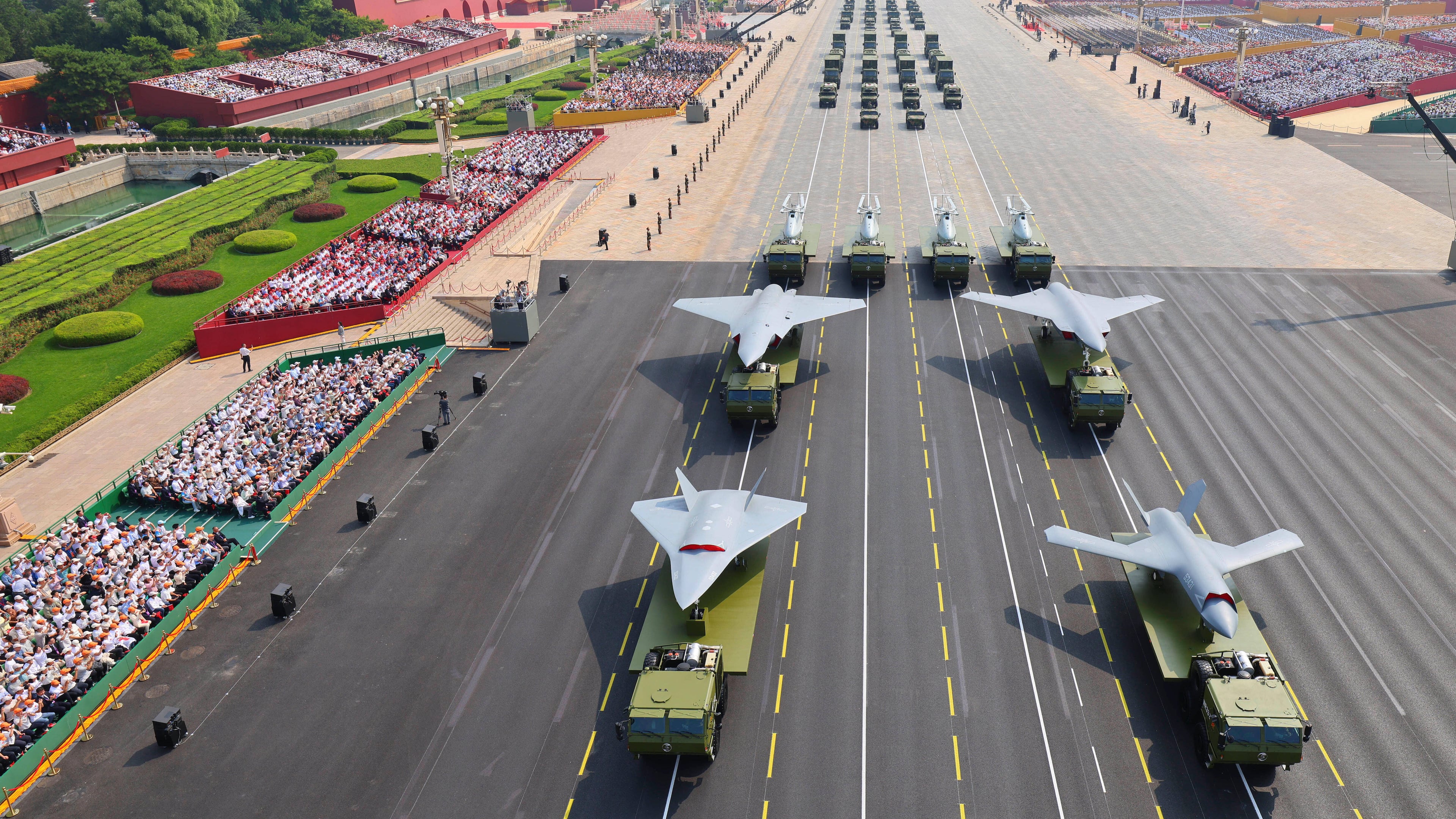 FILE - In this photo provided by China's Xinhua News Agency,In this photo released by Xinhua News Agency, drones and other armament formations pass during the military parade to commemorate the 80th anniversary of the end of World War II held in front of Tiananmen Gate in Beijing, Wednesday, Sept. 3, 2025. (Liu Xu/Xinhua via AP, File)