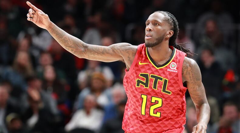 Atlanta Hawks Taurean Prince reacts after scoring against the Milwaukee Bucks during the first half in a NBA basketball game at State Farm Arena on Sunday, Jan. 13, 2019, in Atlanta. Curtis Compton/ccompton@ajc.com