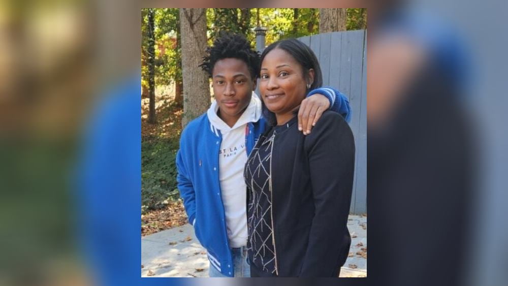 Tiffany Smith (right), posed for a photo with her son, Cameron Jackson, in October of 2022. He was killed later that year.