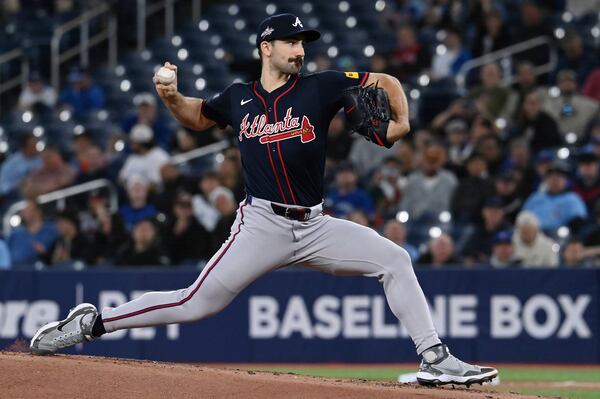 Atlanta Braves starting pitcher Spencer Strider (99) throws to a Toronto Blue Jays batter in the first inning of an interleague baseball game in Toronto, Wednesday, April 16, 2025. (Jon Blacker/The Canadian Press via AP)