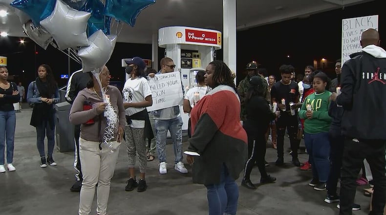 A vigil was held March 5 for John Battle, a 28-year-old man shot and killed at a DeKalb County gas station. Police said he was an innocent bystander who got caught in the crossfire between two feuding groups.