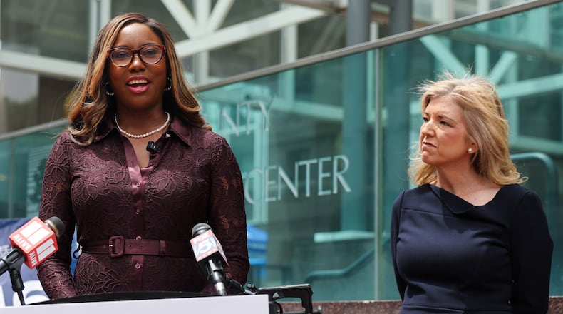 Georgia Supreme Court candidates Miracle Rankin (left) and Jen Jordan speak at a press conference at Fulton County Government Center in April. (Arvin Temkar/AJC)