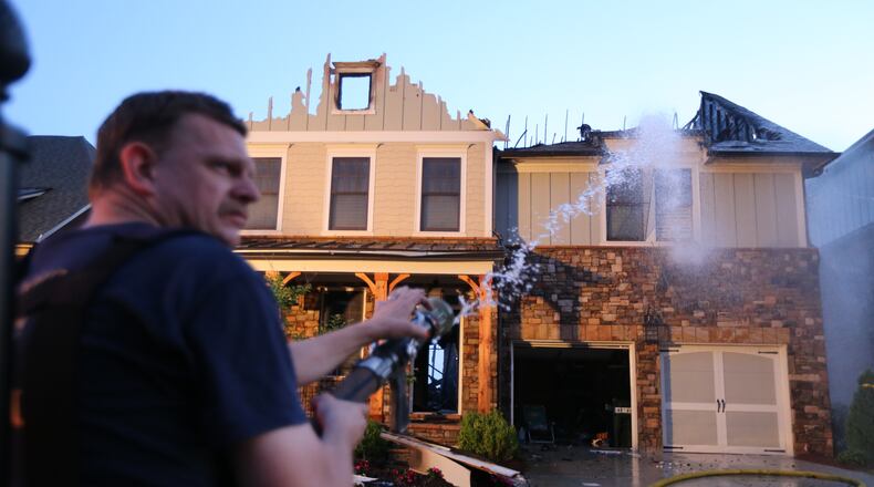 A large, recently-built home was gutted by fire in the Brookhaven area of DeKalb County early Tuesday.