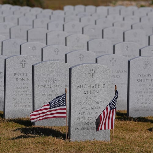 Grave markers of U.S. veterans are shown at the Dallas-Fort Worth National Cemetery where the upcoming annual Veterans Day program has been canceled due to the federal government shutdown in Dallas, Tuesday, Nov. 4, 2025. (AP Photo/LM Otero)