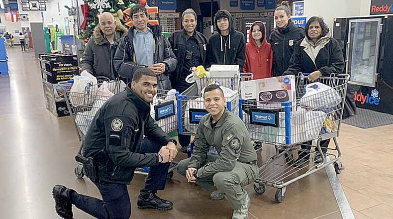 Several City of Atlanta police officers raised money to help a single father of two who lost his job and has had health problems.