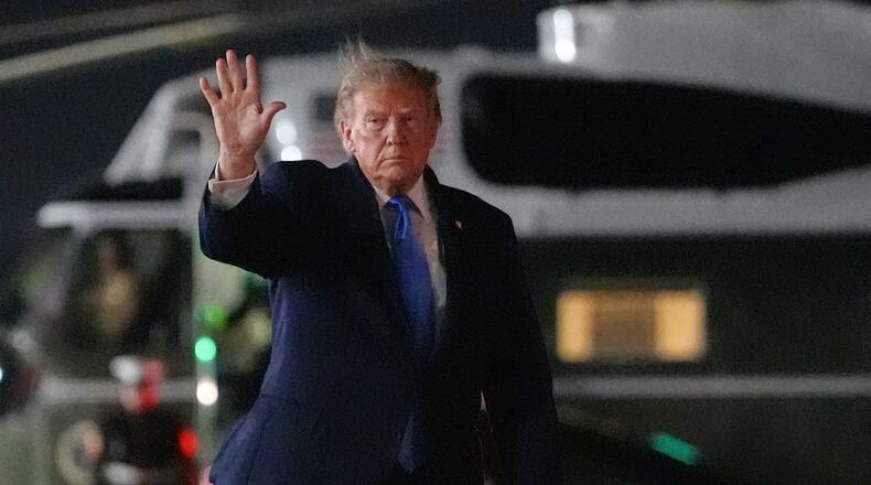 President Donald Trump walks from Marine One to board Air Force One at John F. Kennedy International Airport, Tuesday, Sept. 22, 2026, in New York. (AP Photo/Julia Demaree Nikhinson)