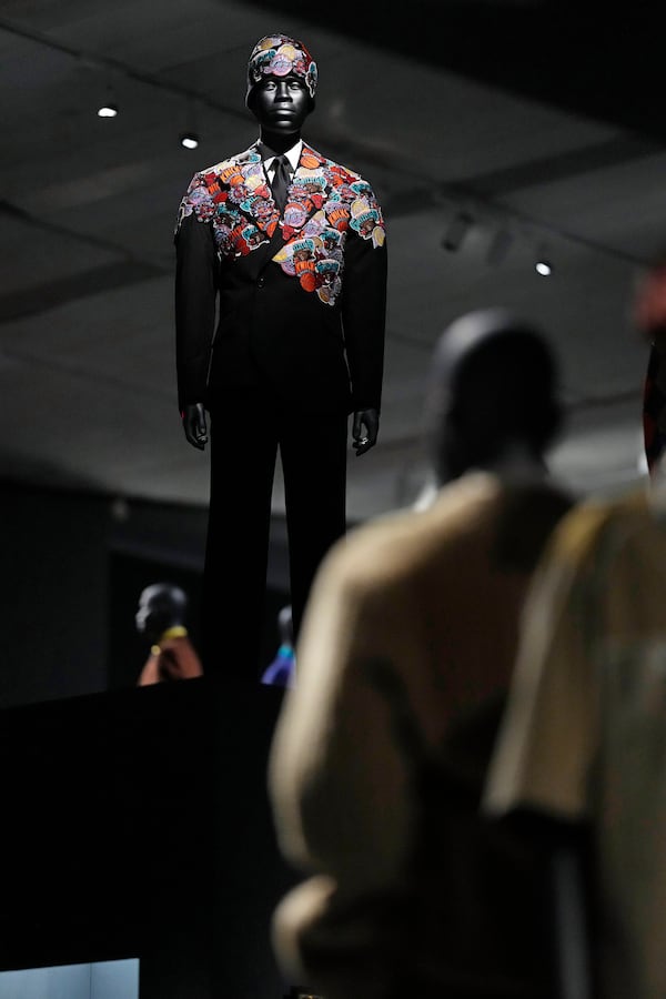 A design by Emeric Tchatchou for 3.Paradis is displayed at the Metropolitan Museum of Art's Costume Institute exhibition, "Superfine: Tailoring Black Style," on Saturday, May 3, 2025, in New York. (Photo by Charles Sykes/Invision/AP)