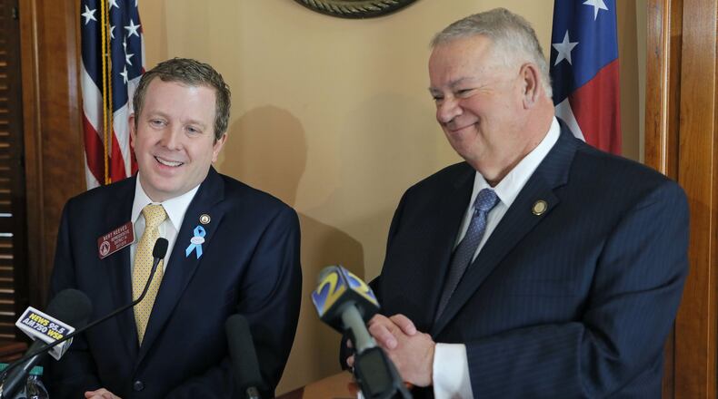 2/5/18 - Atlanta - Rep. Bert Reeves (left), R - Marietta, sponsor of HB 159, the adoption bill, and house speaker David Ralston, react to the passage of the bill during a press conference after the senate vote.  he Georgia Senate passed a compromise over a major overhaul to make adoptions easier in the state. BOB ANDRES  /BANDRES@AJC.COM