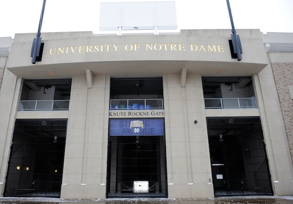 FILE - The Knute Rockne gate to Notre Dame stadium on the campus of the University of Notre Dame Dec. 27, 2012 in South Bend, Ind. (AP Photo/Joe Raymond, File)