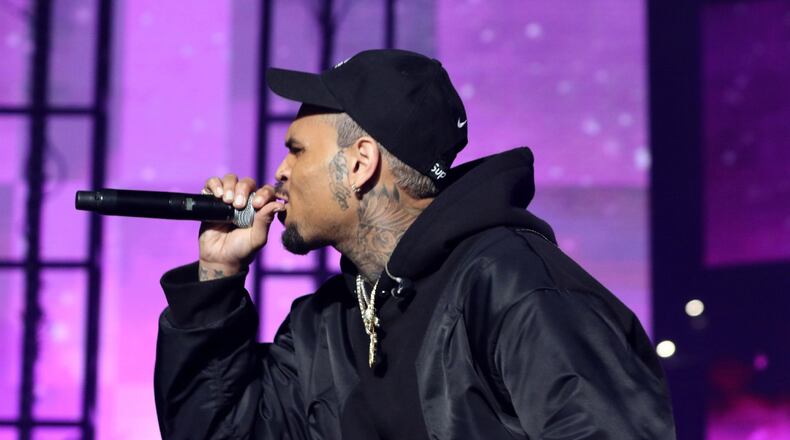 Chris Brown performs at the third annual Lil Baby & Friends Birthday Celebration at sold-out State Farm Arena in Atlanta on Friday, December 9, 2022. Performers included Drake, 21 Savage, GloRilla, Lakeya, Rocko and DJ Fresh. (Photo: Robb Cohen for The Atlanta Journal-Constitution)
