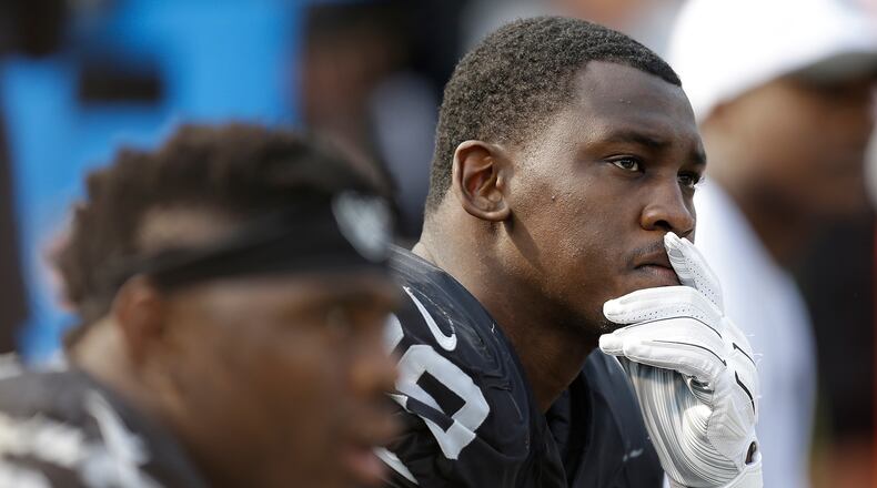 FILE - Oakland Raiders linebacker Aldon Smith (99) sits on the bench during the second half of the team's NFL football game against the Cincinnati Bengals in Oakland, Calif., on Sept. 13, 2015. (AP Photo/Ben Margot, File)