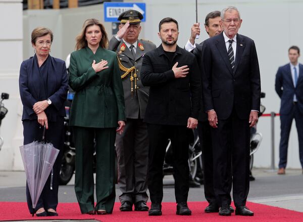 Ukraine's President Volodymyr Zelenskyy, 2nd right, his wife Elena Zelensky, 2nd left, Austrian President Alexander van Der Bellen, right, and his wife Doris Schmidauer stand together in Vienna, Austria, Monday, June 16, 2025. (AP Photo/Heinz-Peter Bader)