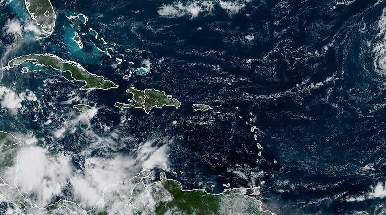 A satellite image captured on Sept. 30, 2024 shows a new disturbance in the Caribbean Sea that the National Hurricane Center says could develop into a tropical storm in the next week or beyond.