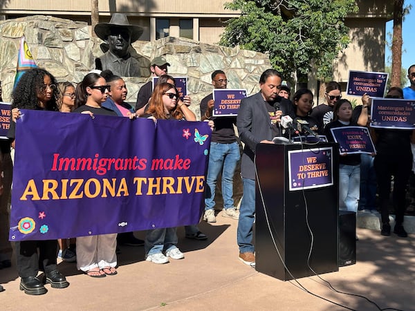 Martín Quezada, a former Democratic state lawmaker and the attorney for the Council on American-Islamic Relations of Arizona, speaks at a news conference alongside advocates for local immigrant rights organizations outside the statehouse in Phoenix on Friday, April 25, 2025. (AP Photo/Terry Tang)