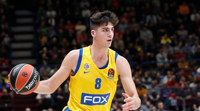 Maccabi Fox Tel Aviv's Deni Avdija controls the ball during the Euro League basketball match between Olimpia Milan and Maccabi Fox Tel Aviv, in Milan, Italy, Tuesday, Nov. 19, 2019. (AP Photo/Antonio Calanni)