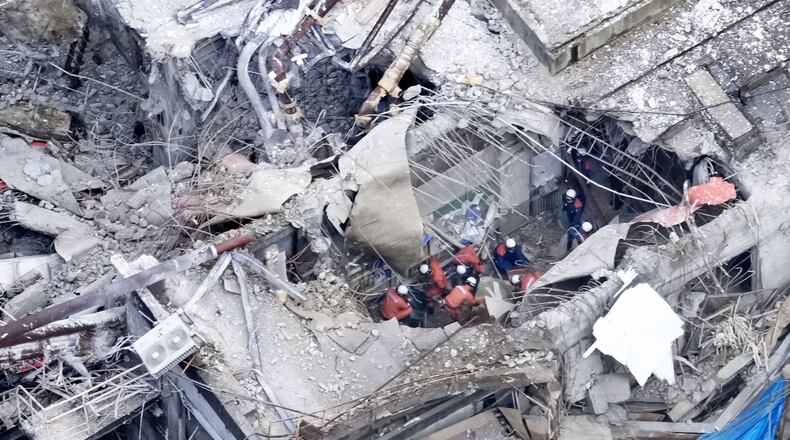 This aerial image shows rescue operation at the Nippon Paper Industries Co.’s Yatsushiro factory, following an earthquake in Yatsushiro, Kumamoto Prefecture, Wednesday, July 29, 2026. (Naoki Hiraoka/Kyodo News via AP)
