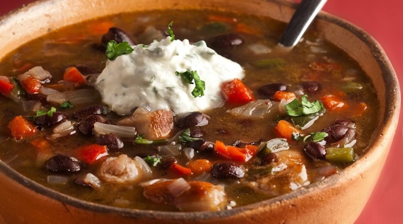 Black beans and Italian sausage form the base of a thick soup, backed up by red bell pepper for sweetness and poblano for some heat. (Bill Hogan/ Chicago Tribune/TNS)