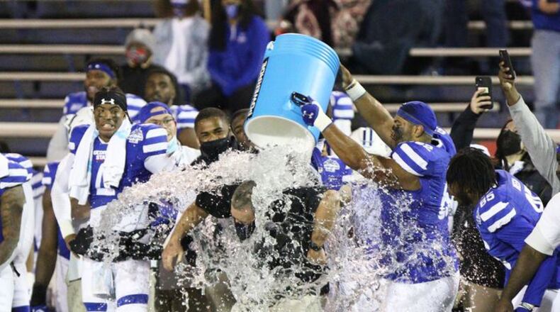 Georgia State head coach Shawn Elliott is dunked with water near the end of the game against Western Kentucky in the LendingTree Bowl on Saturday, Dec. 26, 2020, at Ladd-Peebles Stadium in Mobile, Ala. (Mike Kittrell/AL.com)