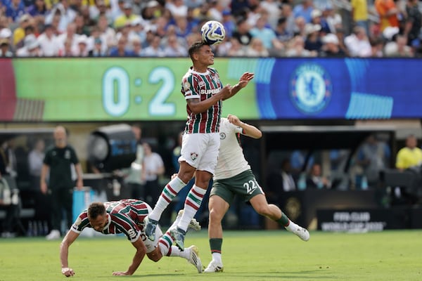 Fluminense's Thiago Silva heads the ball during the Club World Cup semifinal soccer match between Fluminense and Chelsea in East Rutherford, N.J., Tuesday, July 8, 2025. (AP Photo/Adam Hunger)