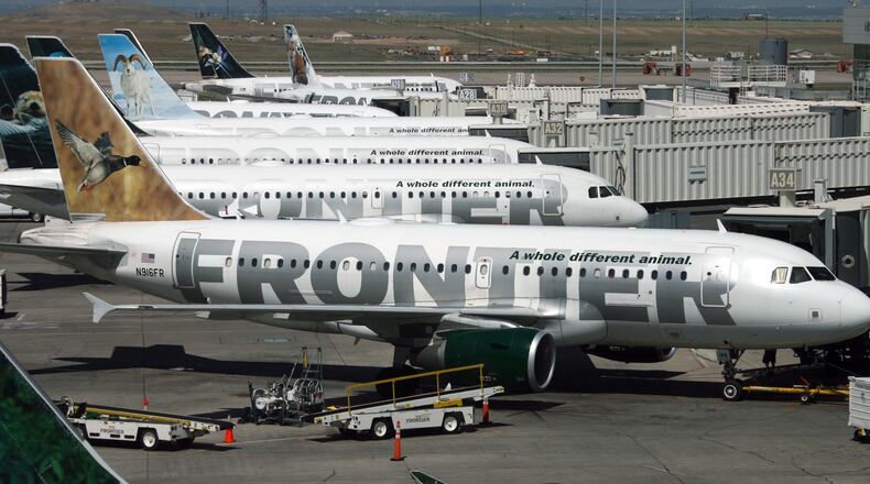 ** FILE ** In this May, 24, 2006 file photo, a long line of Frontier Airlines Airbus 319's sit at the gates on concourse A at Denver International Airport. While past recessions have spawned ultra-cheap airlines, experts say the triple-digit oil prices that are pushing air travel out of reach for average Americans also will almost certainly keep a no-frills carrier from entering the market soon. (AP Photo/David Zalubowski, File)