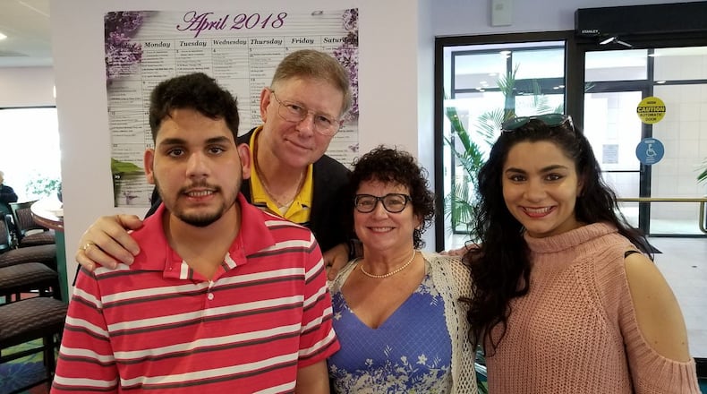 The Renner family provided AJC.com with this photo of Luke (from left), his father Bruce, his mother D'Ann and his sister Sophia.
