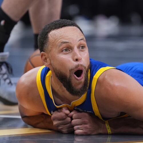 Golden State Warriors guard Stephen Curry (30) reacts after he was fouled during the second half of an NBA Cup basketball game against the San Antonio Spurs in San Antonio, Friday, Nov. 14, 2025. (AP Photo/Eric Gay)