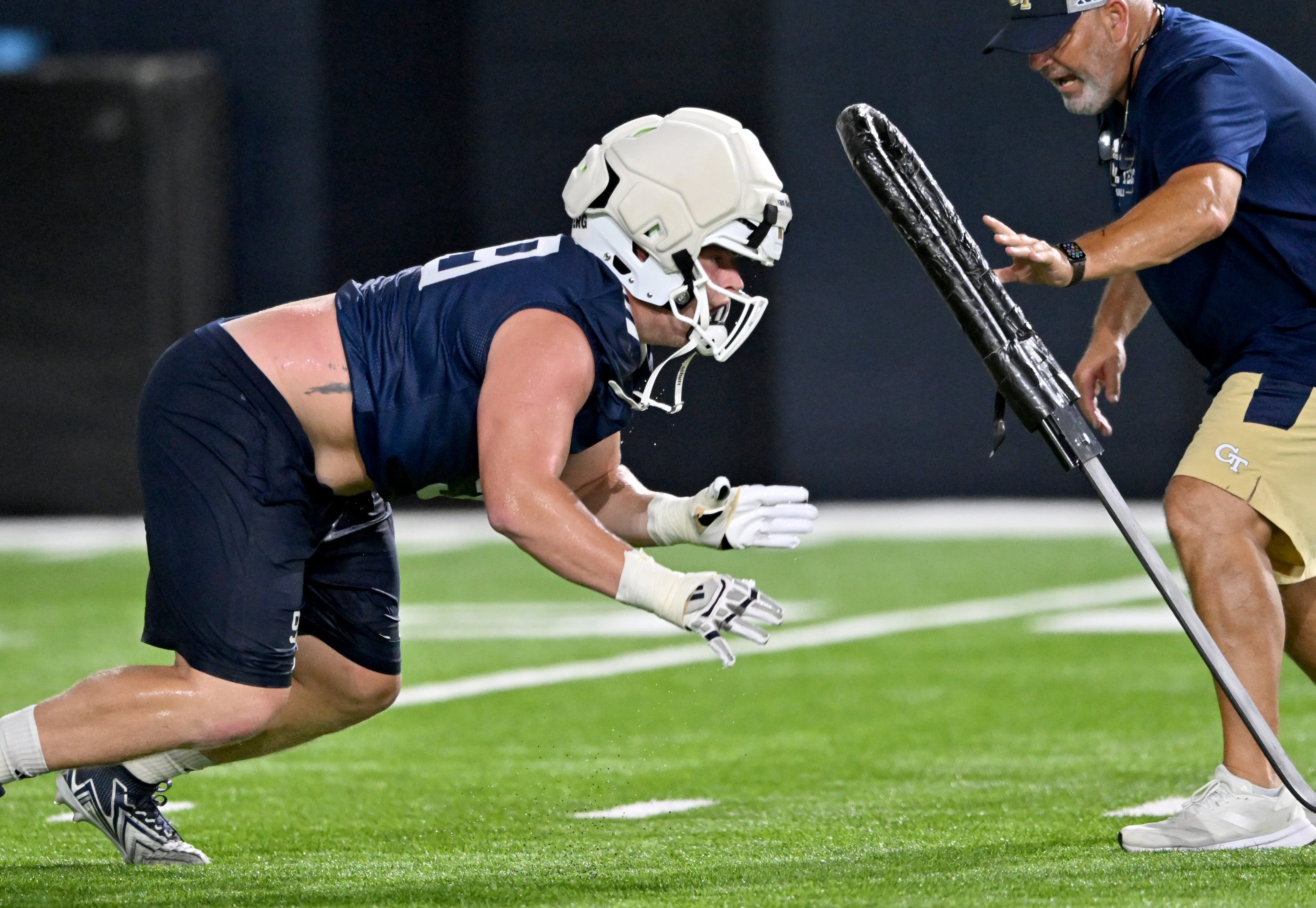 Georgia Tech defensive lineman Jordan van den Berg (99) participates in a drill during the first day of football practice at Rose Bowl Field and the Mary and John Brock Football Practice Facility, Tuesday, July 29, 2025, in Atlanta. (Hyosub Shin / AJC)