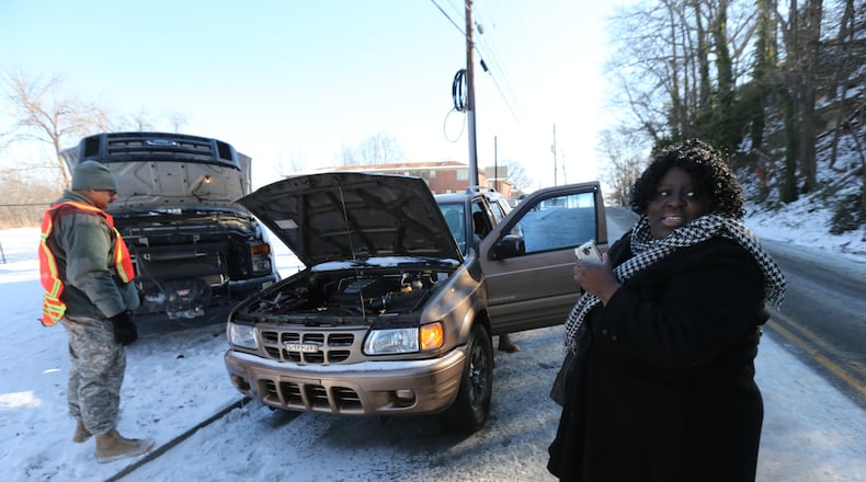 Sharon Edwards retrieves her car on Thursday.