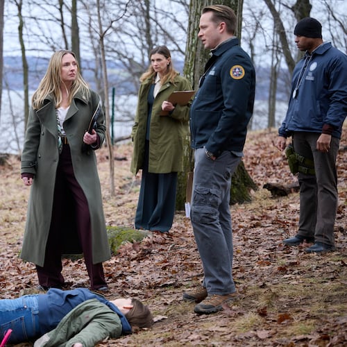 This image released by NBC shows Hope Davis, center, in a scene from "Line of Fire." (Scott Gries/NBC via AP))