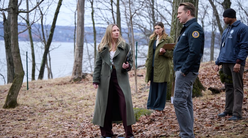 This image released by NBC shows Hope Davis, center, in a scene from "Line of Fire." (Scott Gries/NBC via AP))