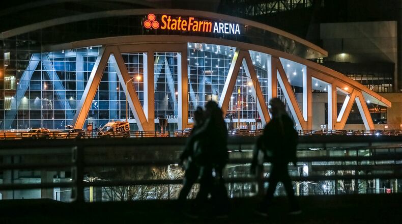January 24, 2020 Atlanta: Morning walkers stroll past State Farm Arena on Monday morning, Jan. 27, 2020 where the Atlanta Hawks played Sunday night mindful of the tragic deaths of Kobe Bryant, who was killed in a helicopter crash along with his daughter and seven others Sunday. Atlanta Hawks Trae Young reflected on the tragedy Sunday following the Hawks game at State Farm Arena. âWe didnât have a lot on our mind besides Kobe and Gigi and everybody in the accident,â Young told Fox Sports Southeastâs Andre Aldridge in his postgame interview after his electric performance. âWe just wanted to go out and play hard, have that mamba mentality.â Gianna, a budding student of the game, was a big fan of Youngâs, who attended some basketball camps of Bryantâs back in high school and watched him play in Oklahoma City in the later years of his career, when he wore No. 24 (the Wizards took a 24-second shot-clock violation to start Sundayâs game). Bryant eventually got in contact with Youngâs trainer, Alex Bazzell, and enlisted his help working with Gianna. She and Bryant sat courtside for two Hawks games this season: the loss in Los Angeles Nov. 17 and the loss in Brooklyn Dec. 21.  In the wake of the crash, Young tweeted about meeting Gianna for the first time after the Lakers game, posting a picture of the two of them about to embrace in a hallway in Staples Center as Bryant looked on. âShe told me how much she loved watching me play,â Young said of the encounter, a smile cracking through the sadness. âShe was a big fan of mine.â JOHN SPINK/JSPINK@AJC.COM