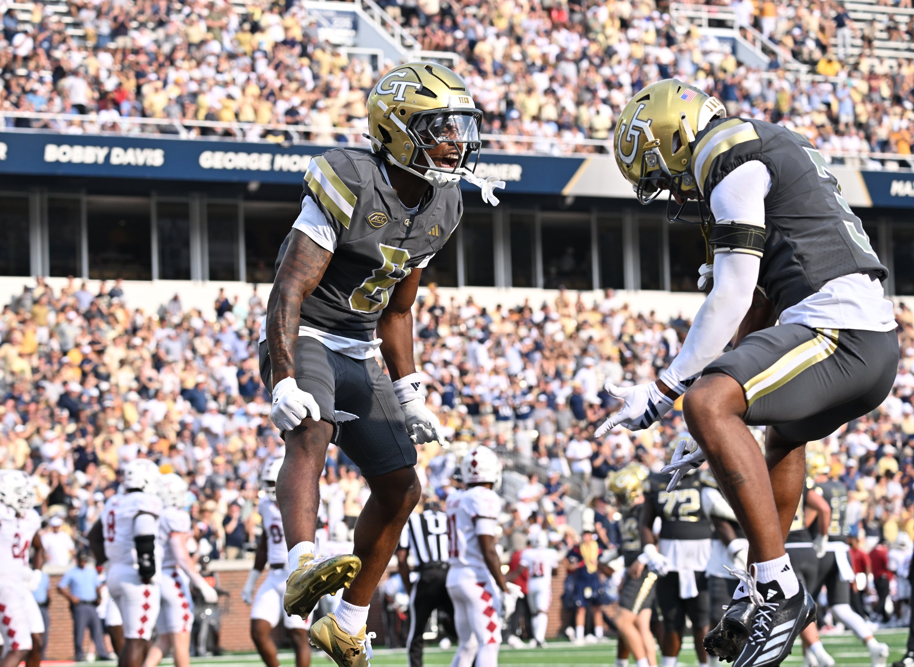 Georgia Tech wide receiver Malik Rutherford celebrates with teammates after scoring a touchdown during the first half of an NCAA college football game at Georgia Tech's Bobby Dodd Stadium, Saturday, Sept. 20, 2025 in Atlanta. (Hyosub Shin/AJC)