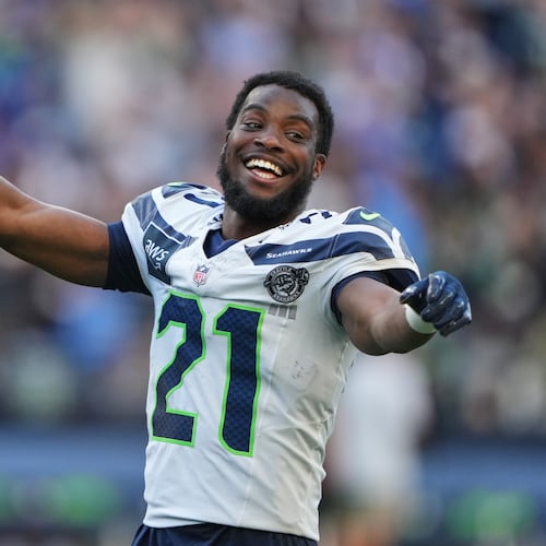 Seattle Seahawks cornerback Devon Witherspoon reacts after the NFL football team's training camp, Saturday, Aug. 8, 2026, in Seattle. (AP Photo/Lindsey Wasson)