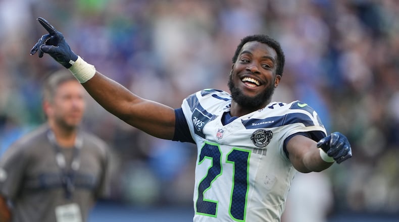 Seattle Seahawks cornerback Devon Witherspoon reacts after the NFL football team's training camp, Saturday, Aug. 8, 2026, in Seattle. (AP Photo/Lindsey Wasson)