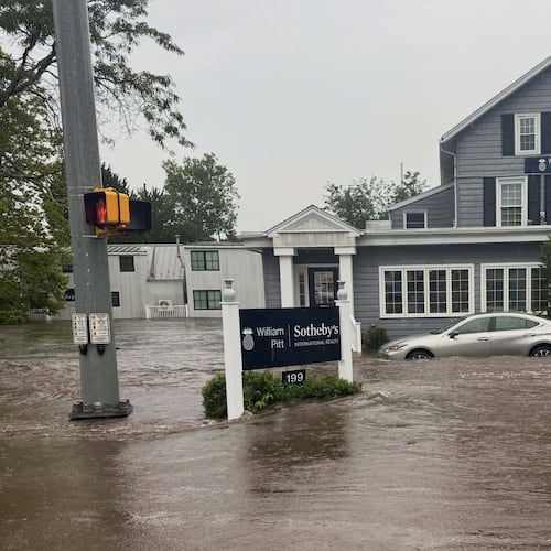 This photo provided by Westport Fire Department shows flash flooding in Westport, Conn., Sunday, Sept. 13, 2026. (Jennifer Petrosinelli/Westport Fire Department via AP)
