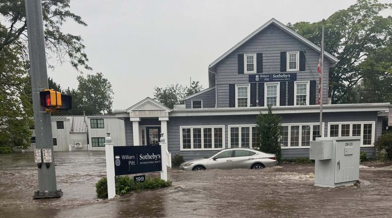 This photo provided by Westport Fire Department shows flash flooding in Westport, Conn., Sunday, Sept. 13, 2026. (Jennifer Petrosinelli/Westport Fire Department via AP)