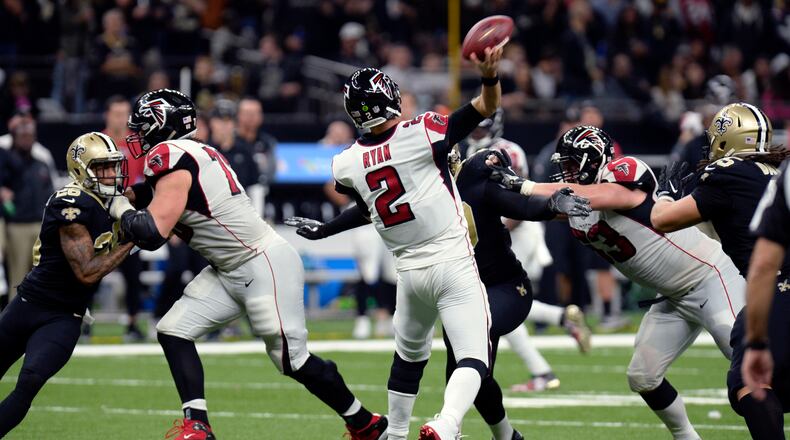 Falcons quarterback Matt Ryan (2) passes under pressure in the second half of an NFL football game against the New Orleans Saints in New Orleans, Sunday, Dec. 24, 2017.