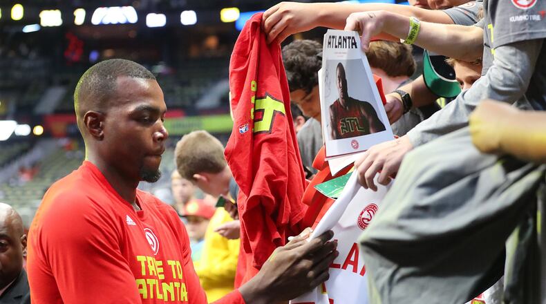 Atlanta Hawks Paul Millsap signs dozens of autographs before playing the Wizards in Game 3 of a first-round NBA basketball playoff series on Saturday, April 22, 2017, in Atlanta. Curtis Compton/ccompton@ajc.com