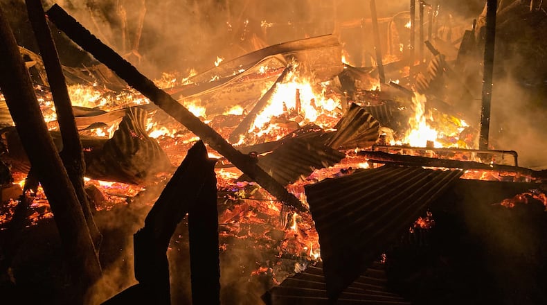 This photo provided by the San Francisco Zen Center shows the remote Tassajara Mountain Zen Center, a Buddhist meditation hall, burning in a fire, Thursday, March 26, 2026, in central California. (San Francisco Zen Center via AP)