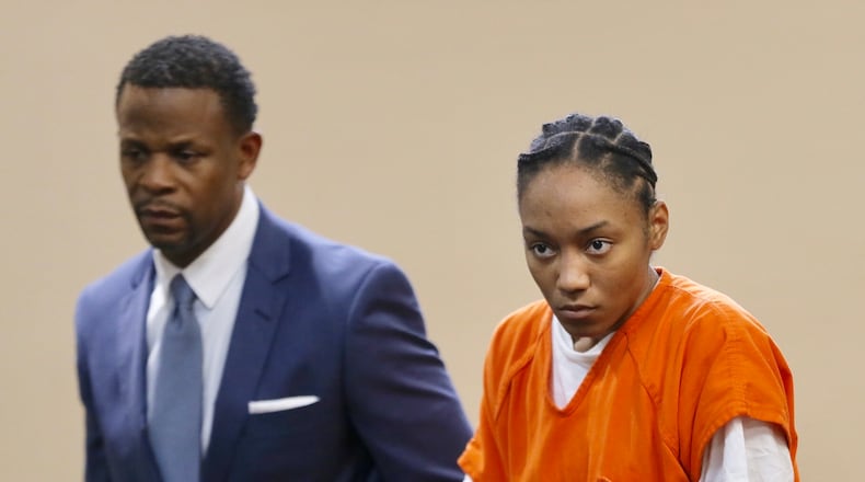 Dijanelle Fowler, 25, in court with attorney Charles Brant on a second-degree murder charge in the hot car death of her 1-year-old daughter, Skylar, on Aug. 3, 2017.