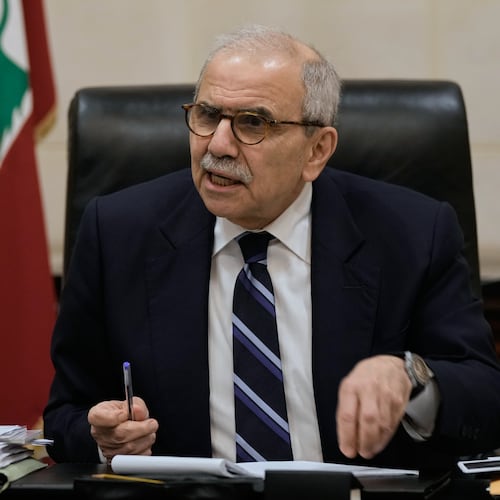 Lebanese Prime Minister Nawaf Salam speaks to journalists working for foreign media and news agencies at the government palace in Beirut, Wednesday, Dec. 3, 2025. (AP Photo/Bilal Hussein)