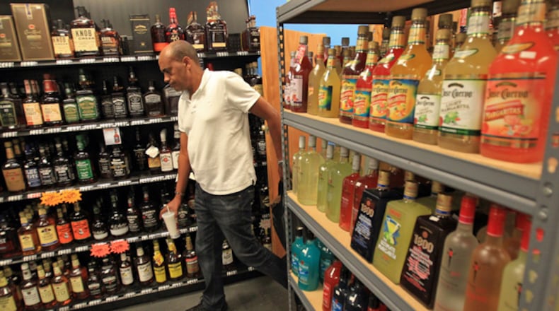 Lilburn package store owners can now own up to two licenses with the city. JASON GETZ / JGETZ@AJC.COM