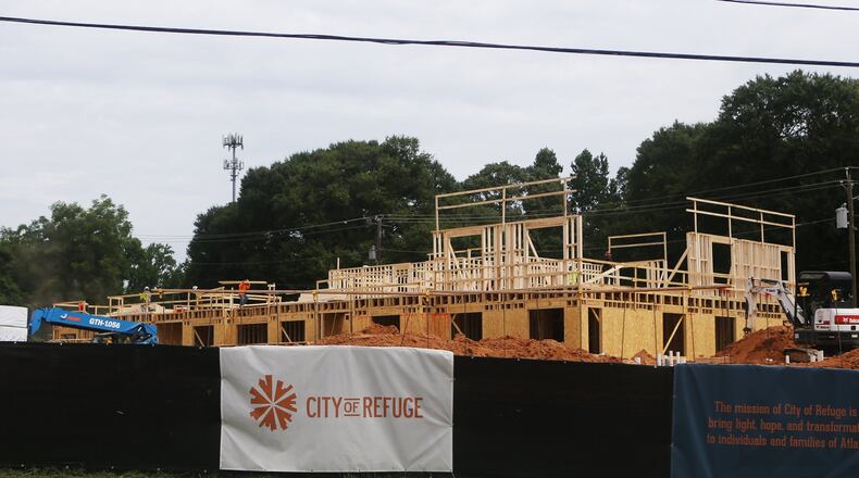 This 47-unit apartment complex, called The 1300, will contain 35 affordable housing units across the street from City of Refuge in Atlanta. Christina Matacotta/Christina.Matacotta@ajc.com
