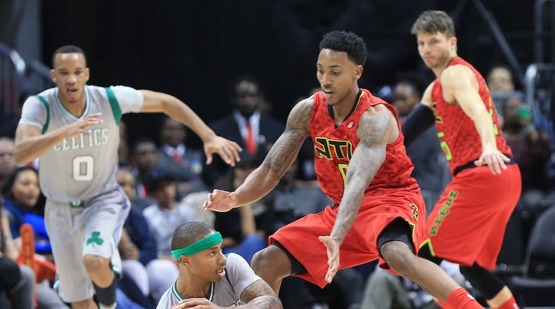 112415 ATLANTA: -- Hawks guard Jeff Teague pressures Celtics guard Isaiah Thomas as the Hawks beat the Celtics 121-97 in a basketball game on Tuesday, Nov. 24, 2015, in Atlanta. Curtis Compton / ccompton@ajc.com