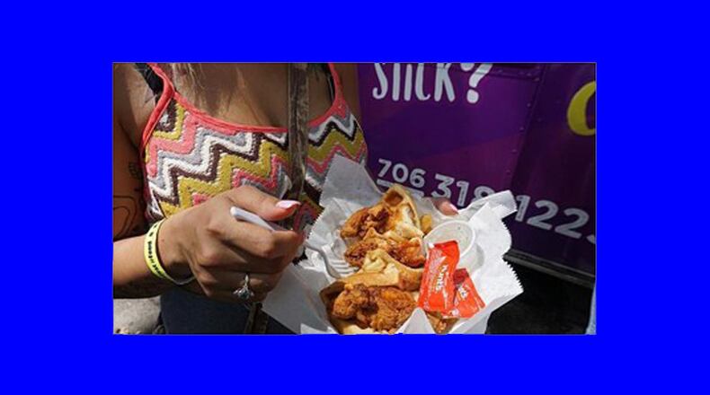 The Taste of Woodstock community food festival has gotten permission from the city to close downtown streets for the Thursday, April 25 event. AJC FILE